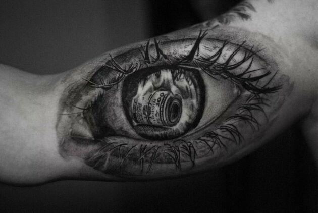 Marcin Nencek Grey eye Tattoo inksearch tattoo